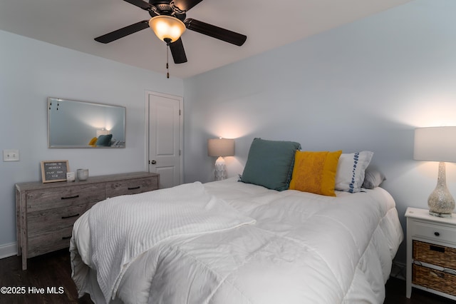 bedroom featuring ceiling fan and wood finished floors