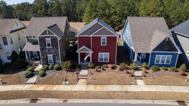 view of front of property featuring covered porch and board and batten siding