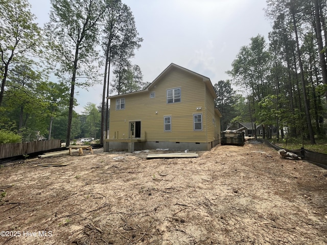859 Blue Bird Dr, Vass, NC 28394 - rear view of house with crawl space and fence