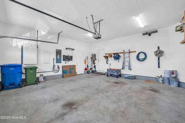 1066 Bradshaw Ter, Wilmington, NC 28412 - garage featuring electric panel and a garage door opener