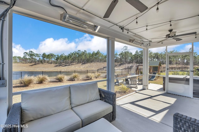 1066 Bradshaw Ter, Wilmington, NC 28412 - sunroom / solarium with ceiling fan and an outdoor living space
