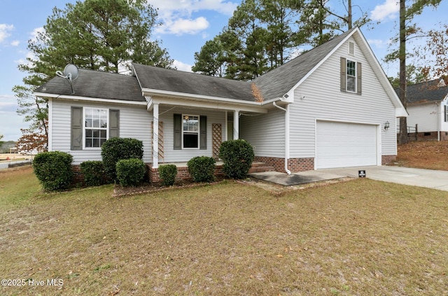 traditional home with a garage, a porch, concrete driveway, and a front yard