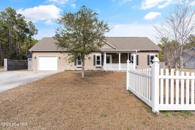 ranch-style house featuring roof with shingles, concrete driveway, covered porch, an attached garage, and fence