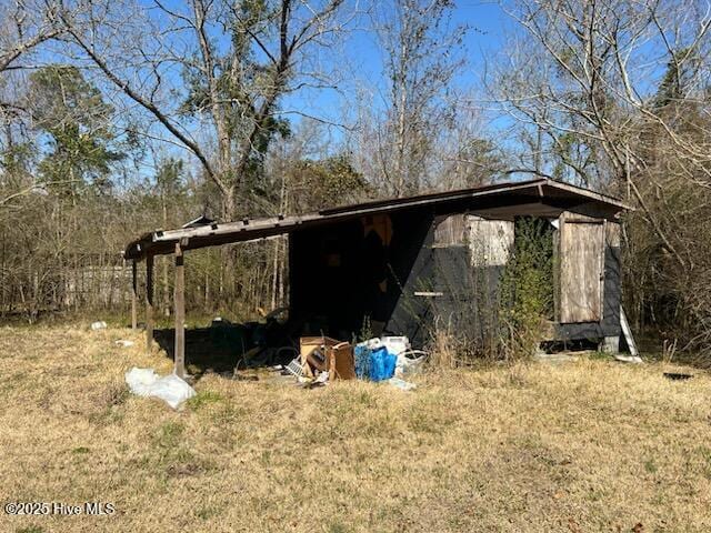 view of outdoor structure with a carport