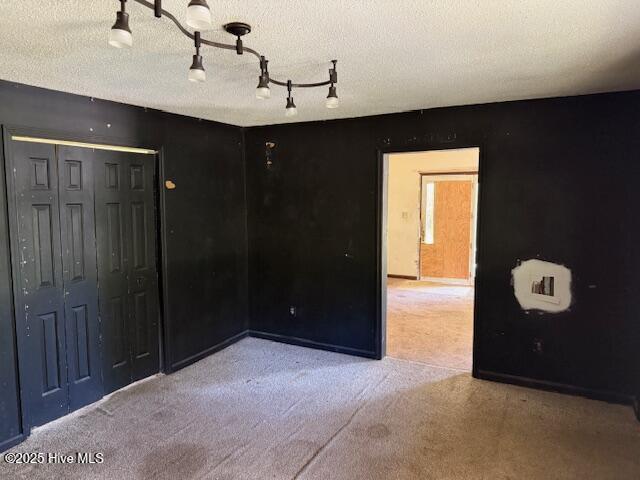 350 Randolphville Rd NE, Bolivia, NC 28422 - unfurnished bedroom featuring carpet and a closet