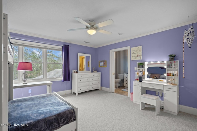 bedroom featuring visible vents, ornamental molding, carpet, and baseboards