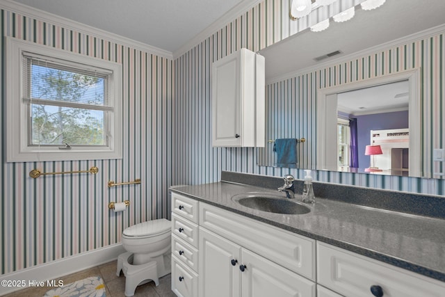 bathroom featuring a healthy amount of sunlight, tile patterned flooring, ornamental molding, and wallpapered walls