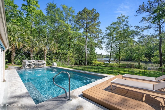 view of swimming pool with a fenced in pool, fence, and a deck with water view