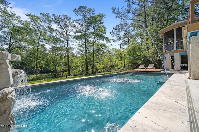 view of pool featuring a fenced in pool, fence, and a patio