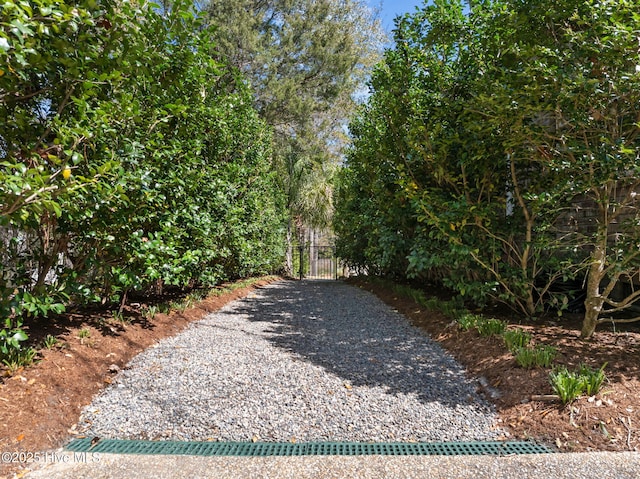 exterior space featuring fence and driveway