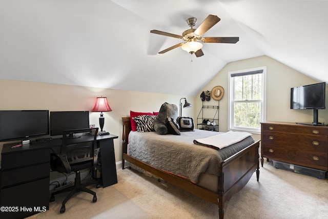 bedroom with a ceiling fan, lofted ceiling, and carpet