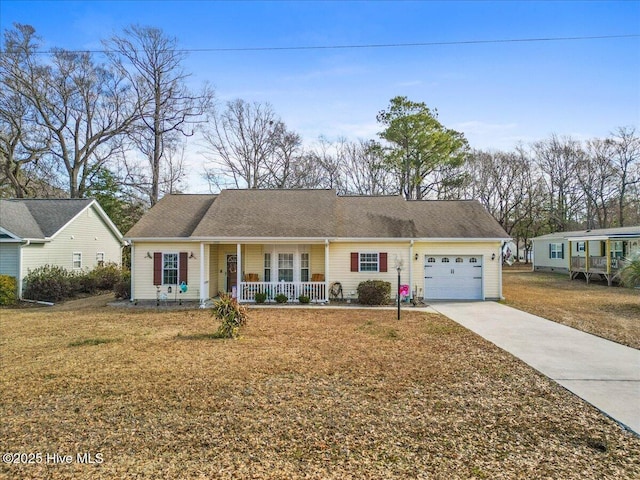 ranch-style house with an attached garage, driveway, a porch, and a front yard