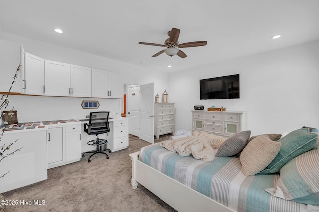 bedroom featuring recessed lighting, light carpet, and ceiling fan