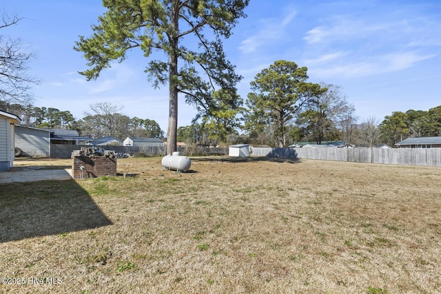 view of yard featuring a patio area and fence