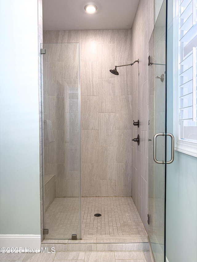 full bath featuring a stall shower