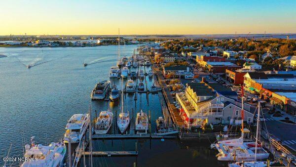 aerial view at dusk with a water view