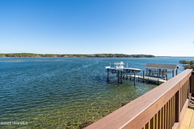 dock area featuring a water view and boat lift