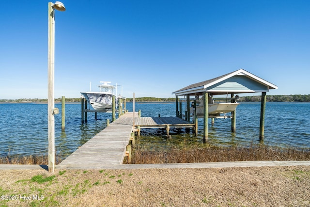 view of dock with a water view and boat lift