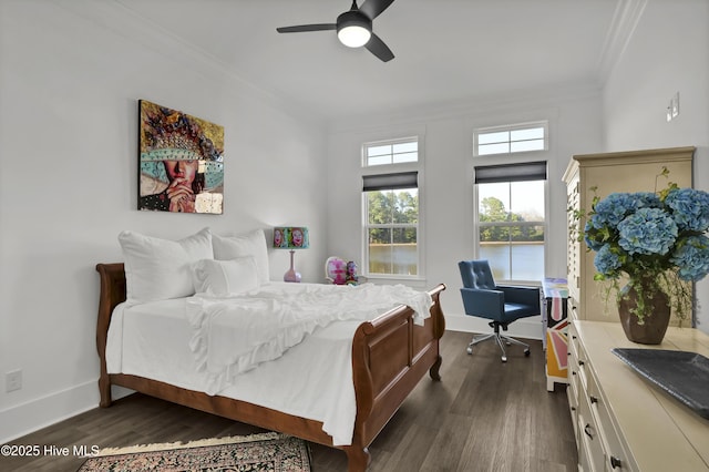 bedroom with a ceiling fan, baseboards, ornamental molding, and dark wood-type flooring