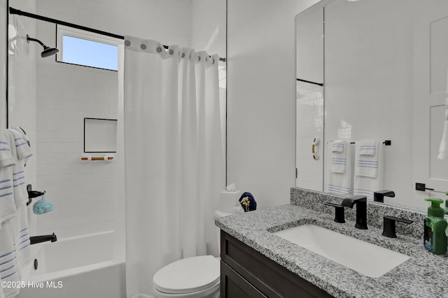 bathroom with toilet, shower / bathtub combination with curtain, and vanity