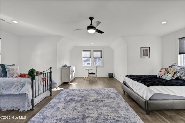 bedroom with ceiling fan, visible vents, dark wood-type flooring, and recessed lighting