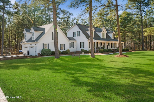 new england style home with covered porch and a front yard