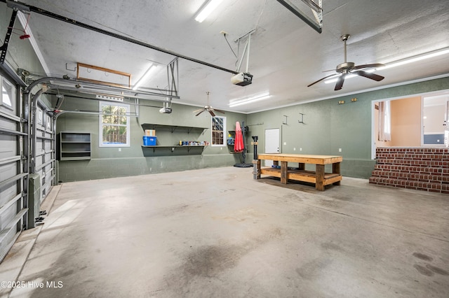 garage featuring a workshop area and a garage door opener