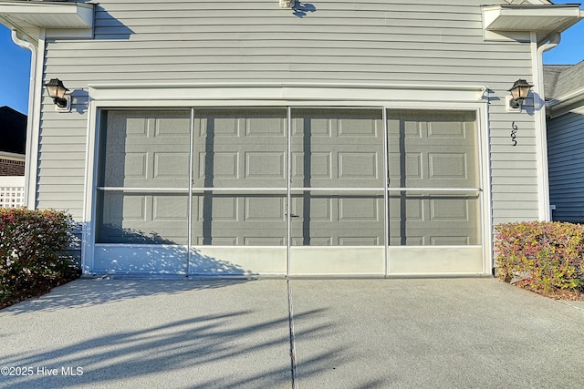garage featuring driveway