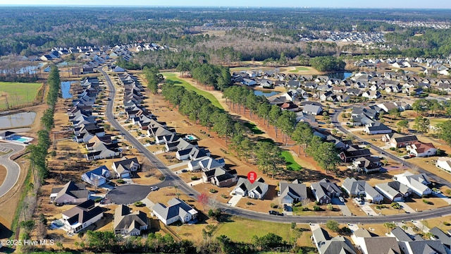 aerial view with a forest view and a residential view