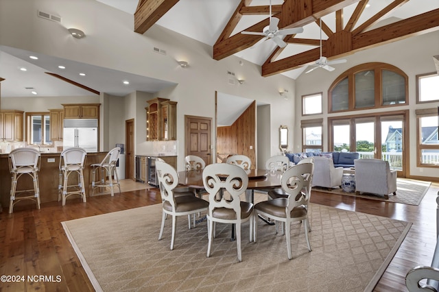 23 Comber Rd, Wilmington, NC 28411 - dining room featuring high vaulted ceiling, wine cooler, wood-type flooring, and visible vents