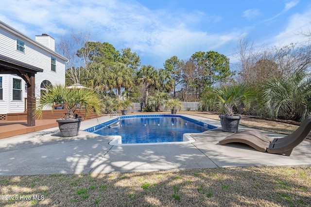 view of swimming pool featuring a fenced in pool, a patio area, and a fenced backyard