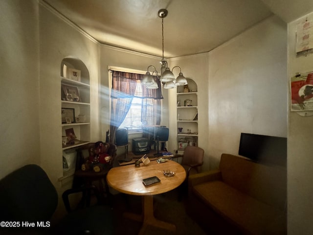 dining space with built in shelves and a notable chandelier