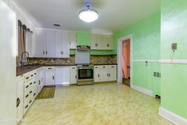 kitchen with stainless steel electric stove, dark countertops, visible vents, white cabinetry, and white dishwasher