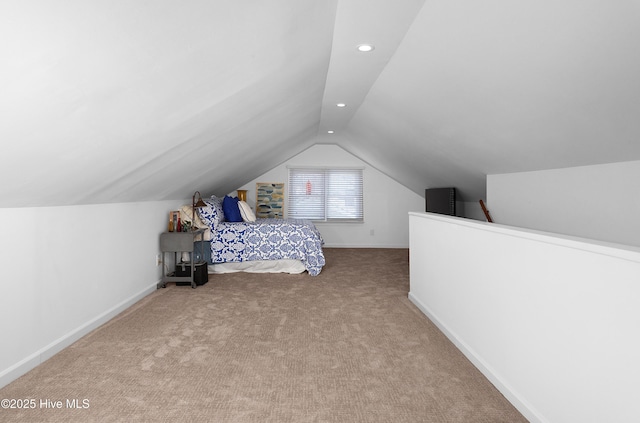 carpeted bedroom with lofted ceiling, recessed lighting, and baseboards