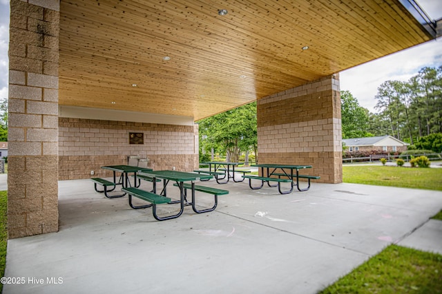 surrounding community with a patio area