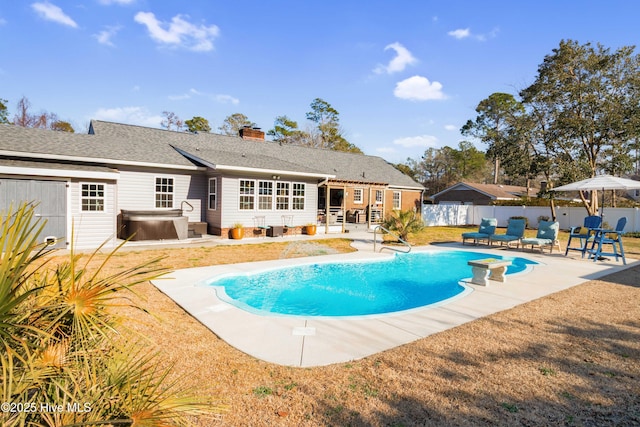 view of pool with a patio, a fenced backyard, a fenced in pool, and a hot tub