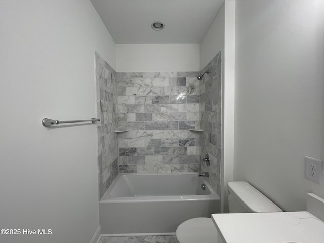 bathroom featuring toilet,  shower combination, and vanity