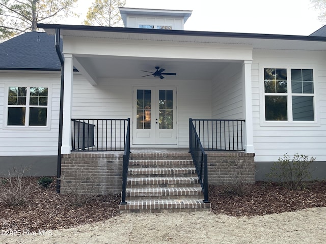 property entrance featuring ceiling fan, french doors, and a porch