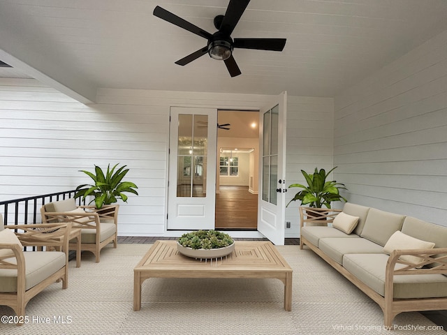 view of patio with ceiling fan and outdoor lounge area