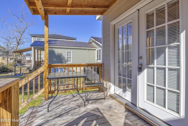 wooden deck with french doors