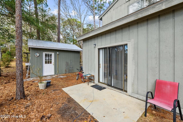 view of patio / terrace featuring an outdoor structure