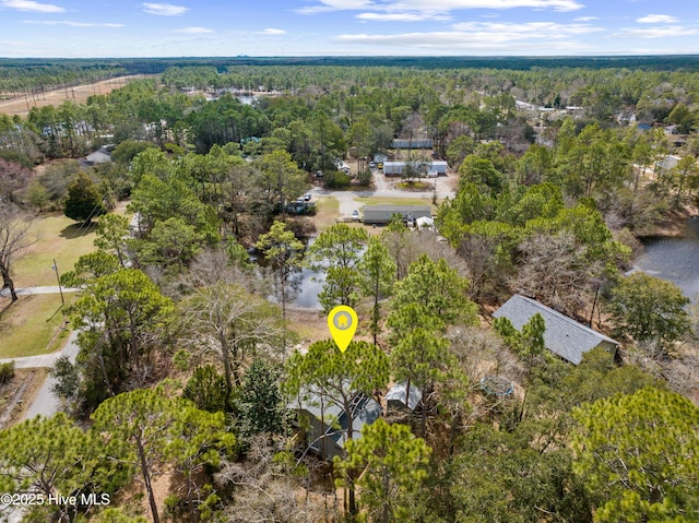 bird's eye view featuring a forest view