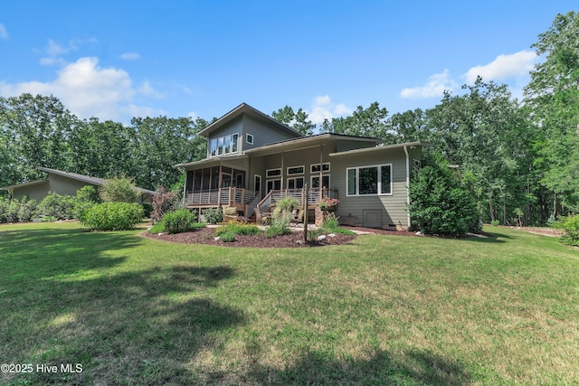 mid-century modern home featuring crawl space, a sunroom, and a front yard