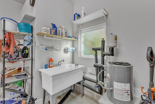 laundry area with a sink