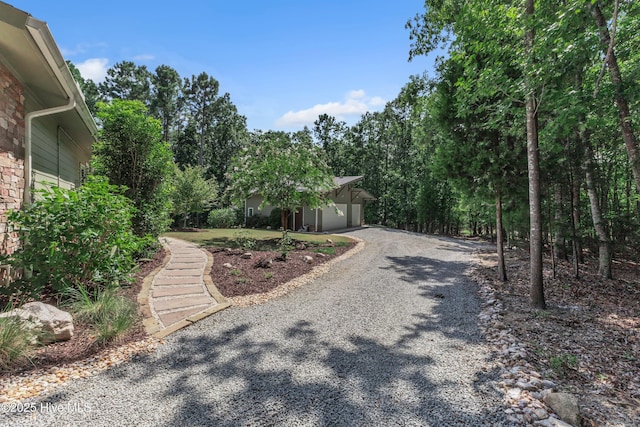 exterior space featuring gravel driveway