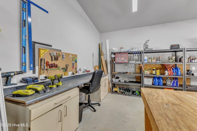 office area featuring concrete flooring