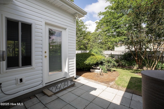 view of patio featuring fence