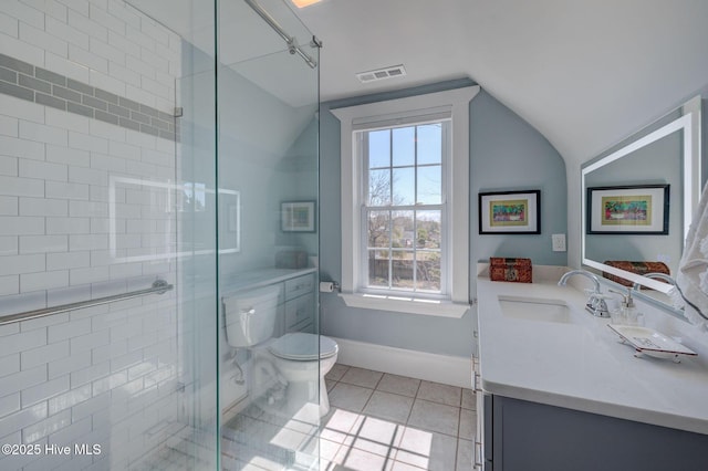 full bath with visible vents, a stall shower, vaulted ceiling, tile patterned floors, and toilet