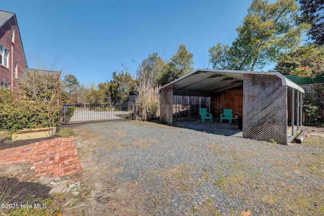 exterior space with a gate and fence