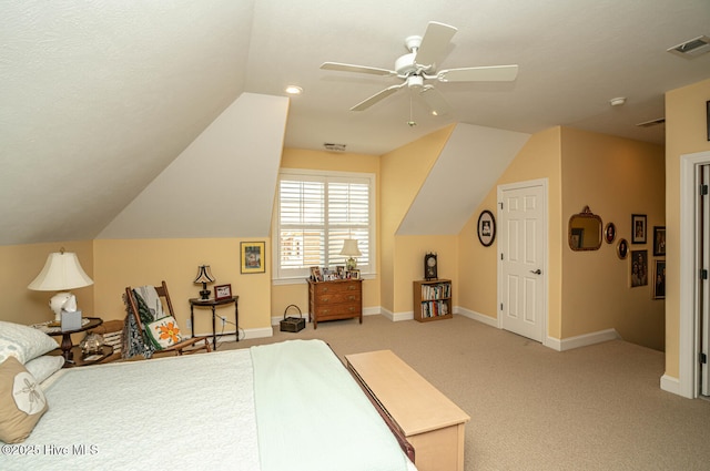 bedroom with lofted ceiling, light colored carpet, a ceiling fan, baseboards, and visible vents